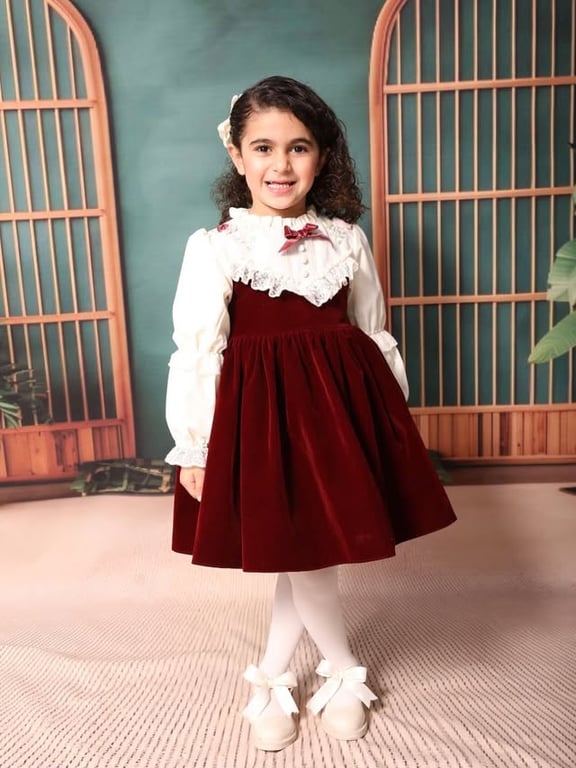 Photo by كوالا كفر قرع on March 22, 2026. May be an image of child, dress and text.