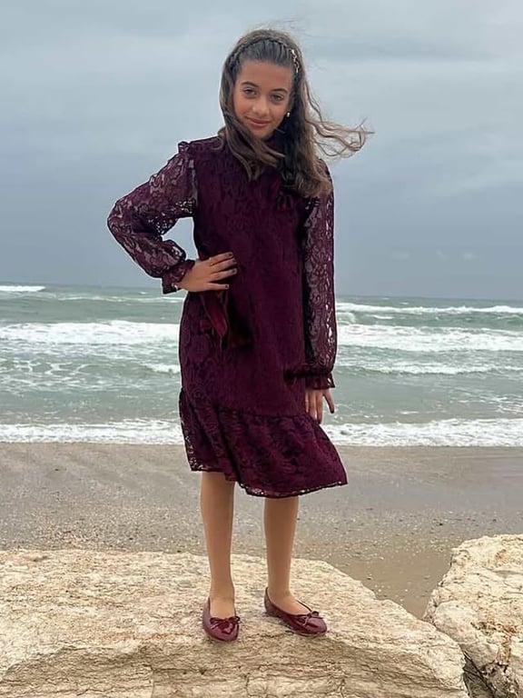 Photo by كوالا كفر قرع on March 22, 2026. May be an image of dress, ocean and text.