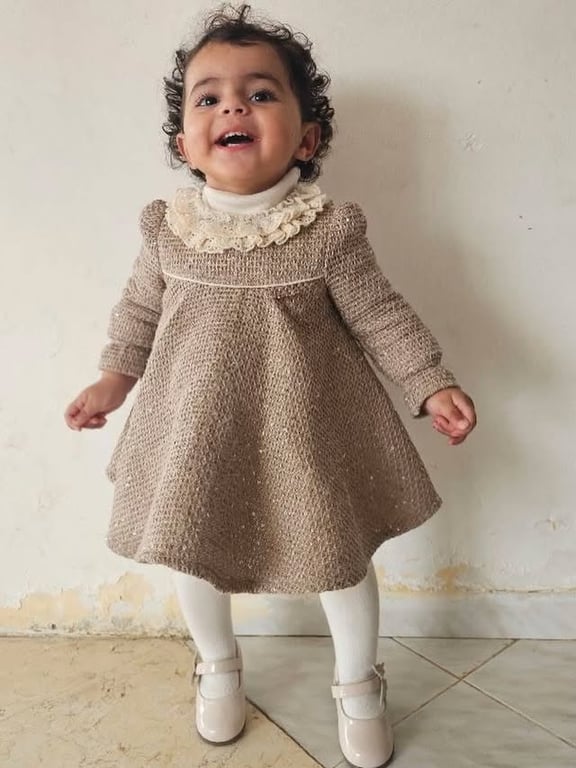 Photo by كوالا كفر قرع on March 22, 2026. May be an image of baby, crochet, dress, knit an