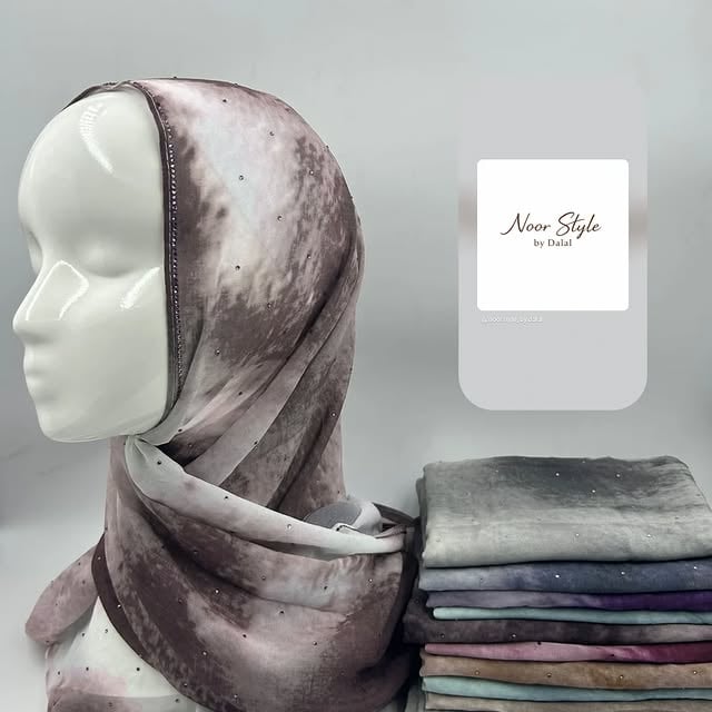 Photo by نور ستايل-ام الفحم on April 08, 2026. May be an image of scarf, headscarf, shawl 