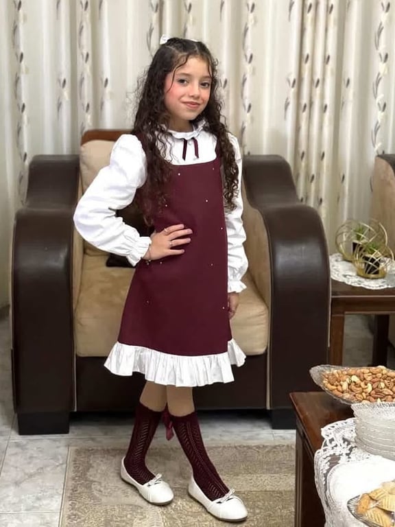 Photo by كوالا كفر قرع on March 22, 2026. May be an image of child, skirt, dress and text.